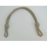 A WWII German Army peak cap cord measuri