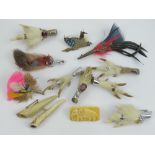 A quantity of brooches including a number of Scottish grouse / rabbit foot brooches.