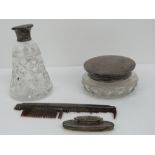 A Mappin & Webb HM silver dressing set including a cut glass perfume bottle, cut glass pot,