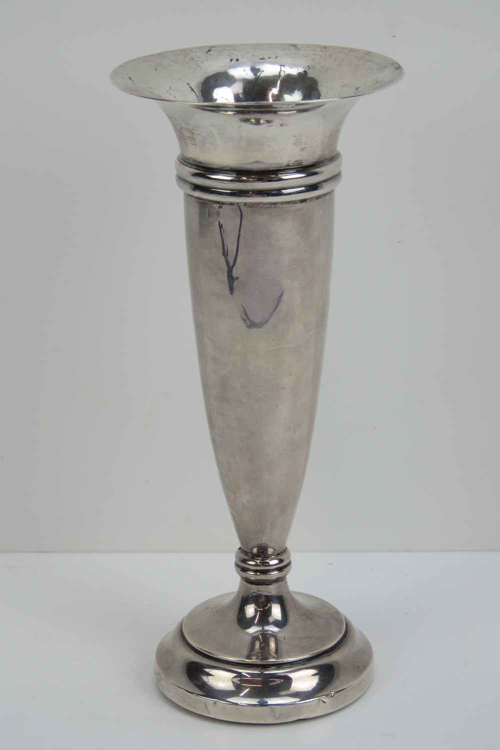 A HM silver bud vase standing 17cm high, hallmarked Birmingham 1919.