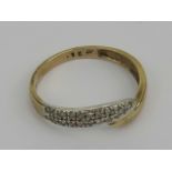A 9ct gold and diamond ring, two rows of diamonds set in white metal on yellow metal hallmarked 375,