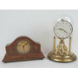 A Bentima brass four hundred day torsion clock with class dome c1960s, 32cm high.