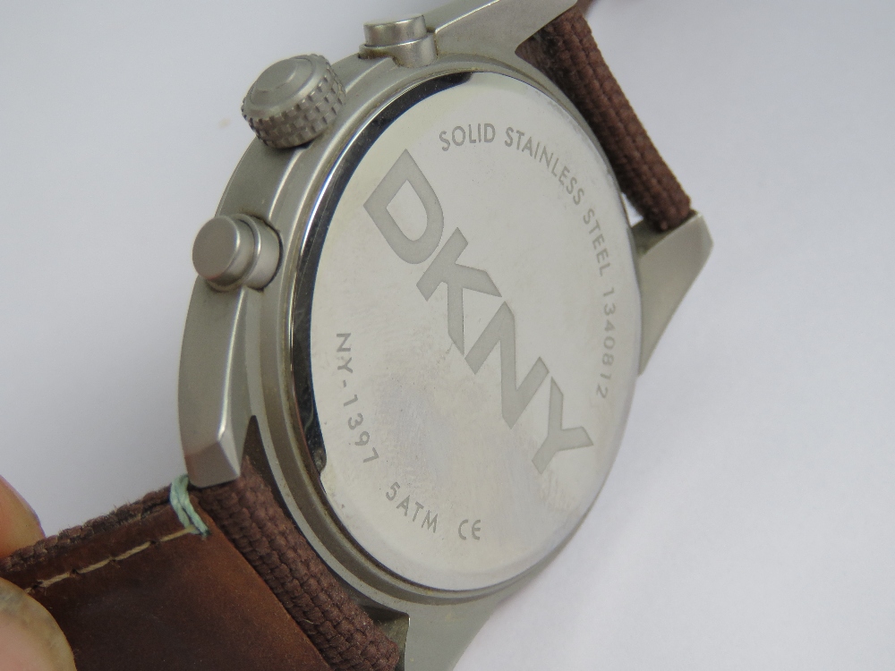 A DKNY stainless steel gents wristwatch having brown dial with three subsidiary dials and date - Image 2 of 3