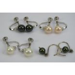 Four pairs of silver and pearl earrings - three screw back and one with hook hangers.