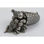 A 925 Italian silver centrepiece in the form of a cornucopia of fruit spilling from a woven basket,