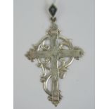 A large Sterling silver cross pendant having vine upon and complete with niello work bale, 7.