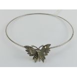 A sterling silver butterfly choker, approx 10.5cm dia, butterfly 3cm wingspan.