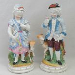 A pair of 19th century Continental figures, lady and gentleman, each with greyhound,