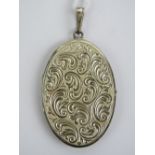 A good heavy 925 silver locket having floral decoration throughout measuring 5.7cm in length.
