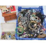 A large quantity of assorted costume jewellery including a vintage Casio watch in original box,