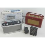 A vintage red leatherette Roberts Radio with charger, together with another Roberts radio in box,