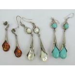 Three pairs of large 925 silver earrings of floral form set with baltic amber,