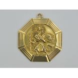 A George Jenson 9ct gold St Christopher pendant, London hallmark, 23mm wide, 5.8g.