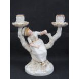 A Royal Worcester twin sconce candelabra in the form of a girl upon tree branches. One sconce a/f.