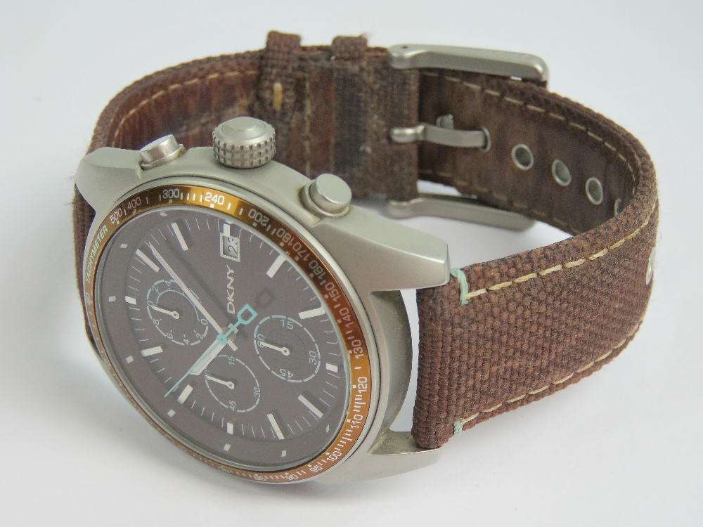 A DKNY stainless steel gents wristwatch having brown dial with three subsidiary dials and date - Image 3 of 3