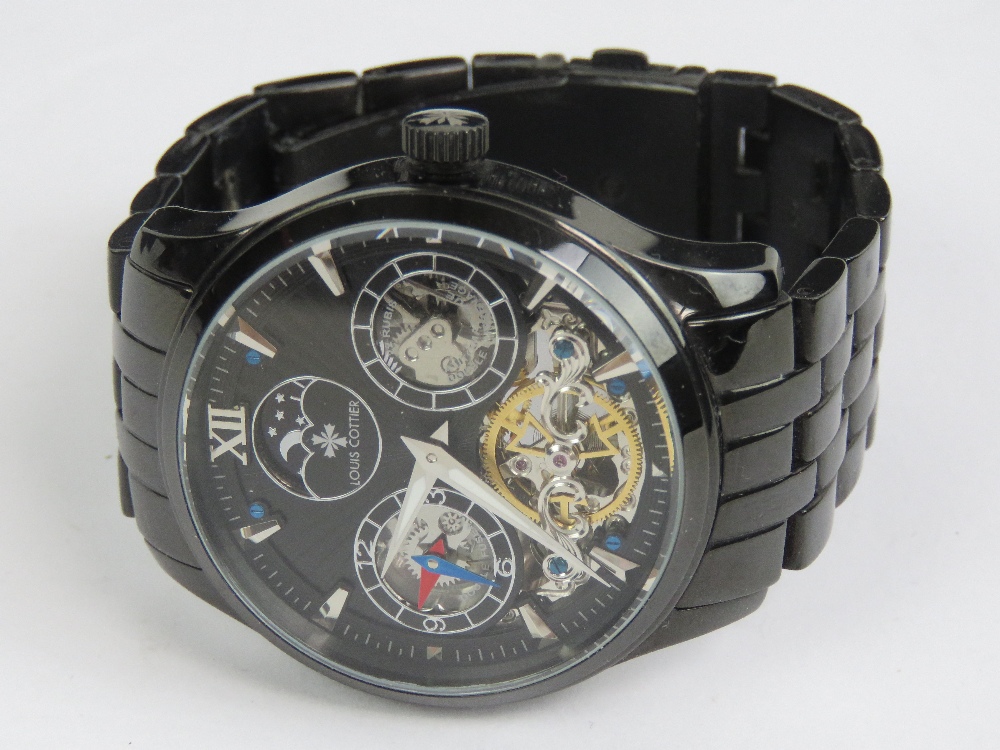 A Louise Cottier automatic Dual Time 'Phantom' wristwatch in black stainless steel having skeleton - Image 4 of 6