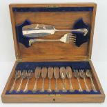 A 20th century boxed fish set, six settings.