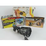 A Stanley Handyman plane in box, together with a work lamp, a twin barrel foot pump in box,