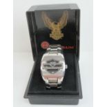 A Bulova Harley Davidson model 76B35 flip top stainless steel watch having baton hands,