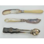 A pair of Victorian HM silver sugar tongs, hallmarked London 1841 and weighing 2.