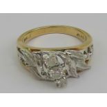 A 14ct gold and diamond ring,
