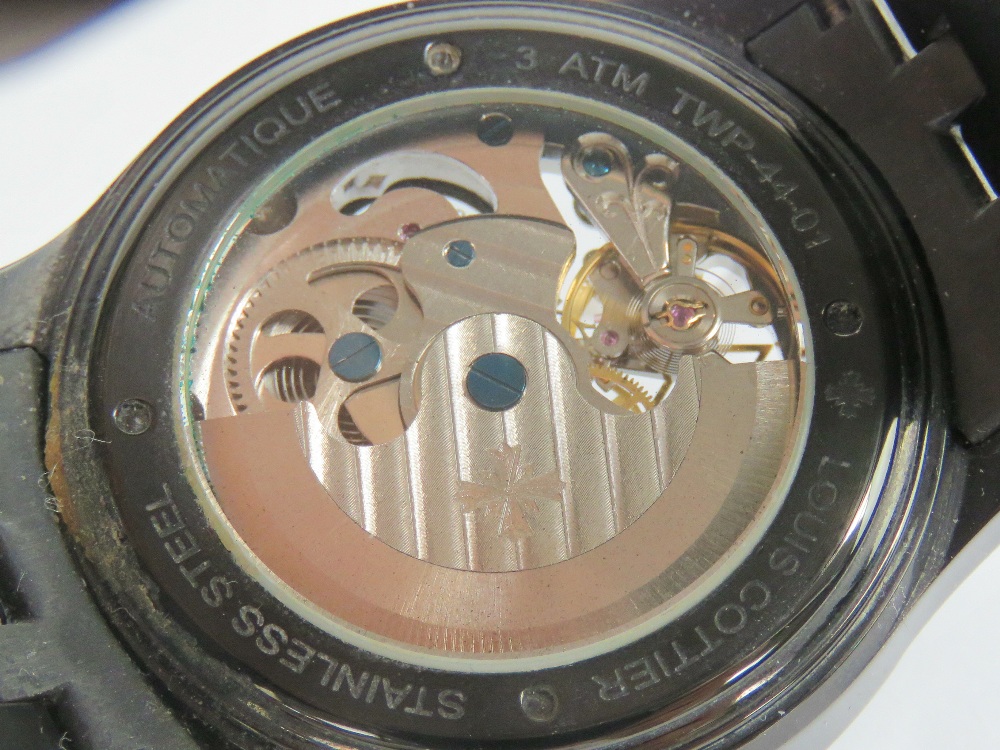 A Louise Cottier automatic Dual Time 'Phantom' wristwatch in black stainless steel having skeleton - Image 6 of 6