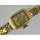 A vintage 9ct gold Customline ladies manual wind cocktail watch, hallmarked 375.