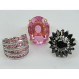 Three silver cocktail rings each stamped 925, four row pink stone ring size M,