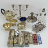 A quantity of assorted silver plated items including; three sconce candelabra, tea service,