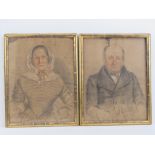 A pair of 19th century naive pastel and pencil portraits of a gentleman and lady,