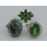 Three 925 silver and green stone rings; floral diopside size O,