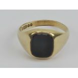 A 9ct gold and black onyx signet ring, unengraved, hallmarked London, size R, 2.7g.