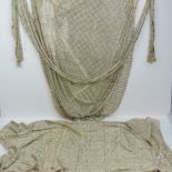 A vintage c1920s silvered foil shawl slightly a/f, together with another similar a/f.