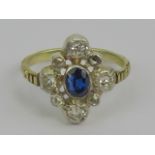 A 14ct gold diamond and sapphire ring central oval cut sapphire approx .0.
