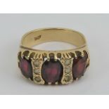 A vintage 9ct gold garnet and spinel rin