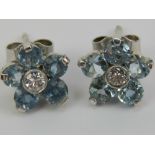 A pair of aquamarine and diamond stud ea