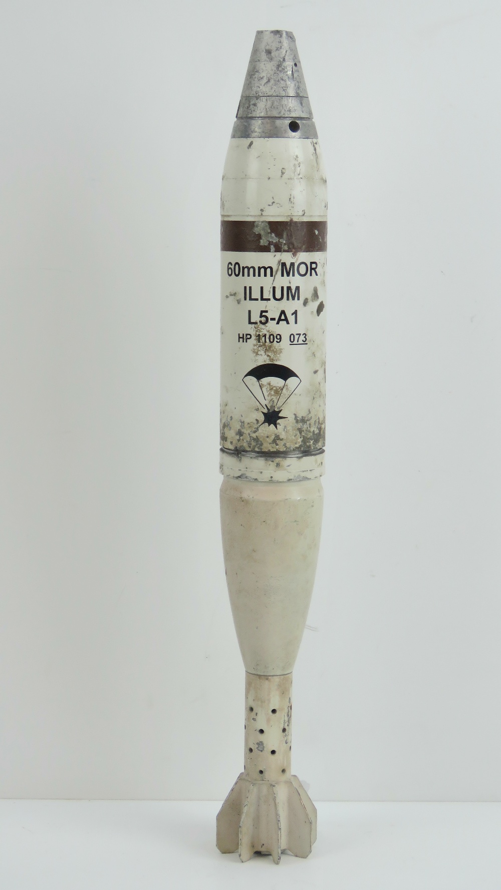 A British 60mm L5-A1 Illumination mortar round. 47cm high.