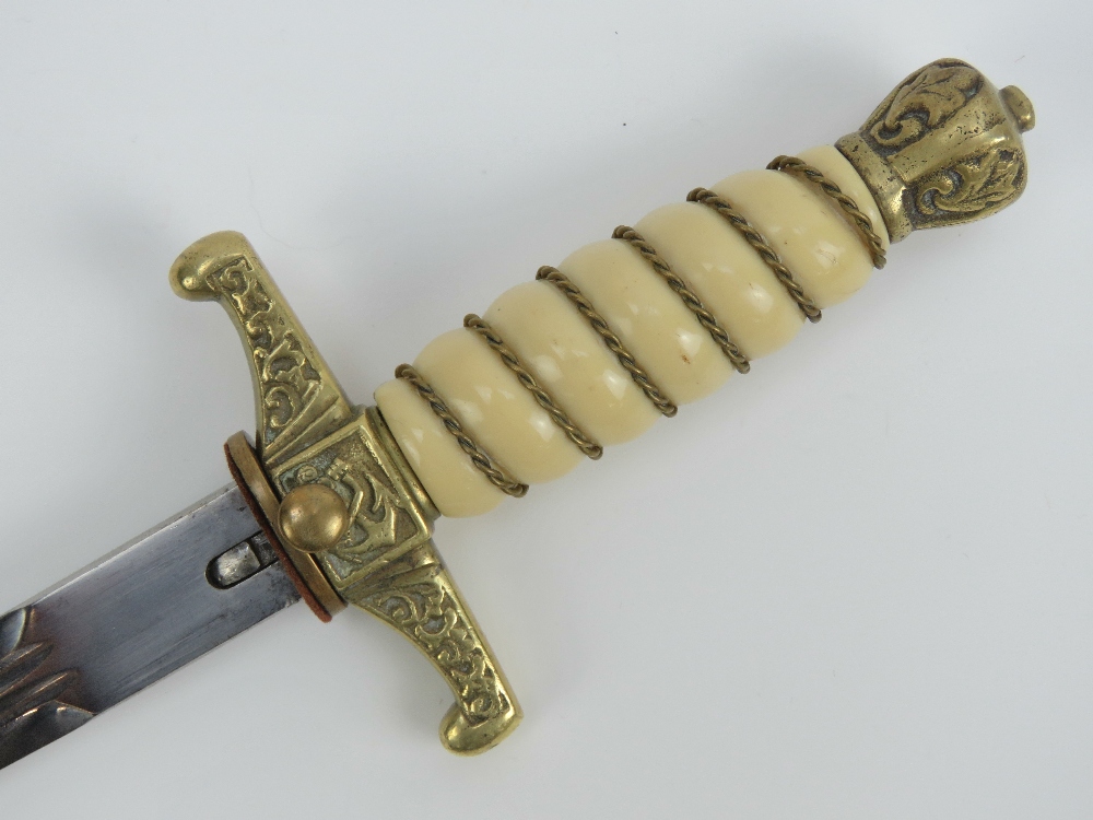 A WWII German Naval Officers dagger having brass scabbard and 25cm blade, - Image 3 of 4