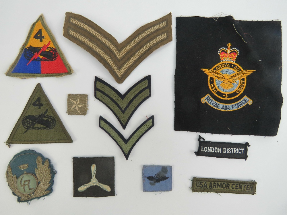 An assortment of original cloth badges.