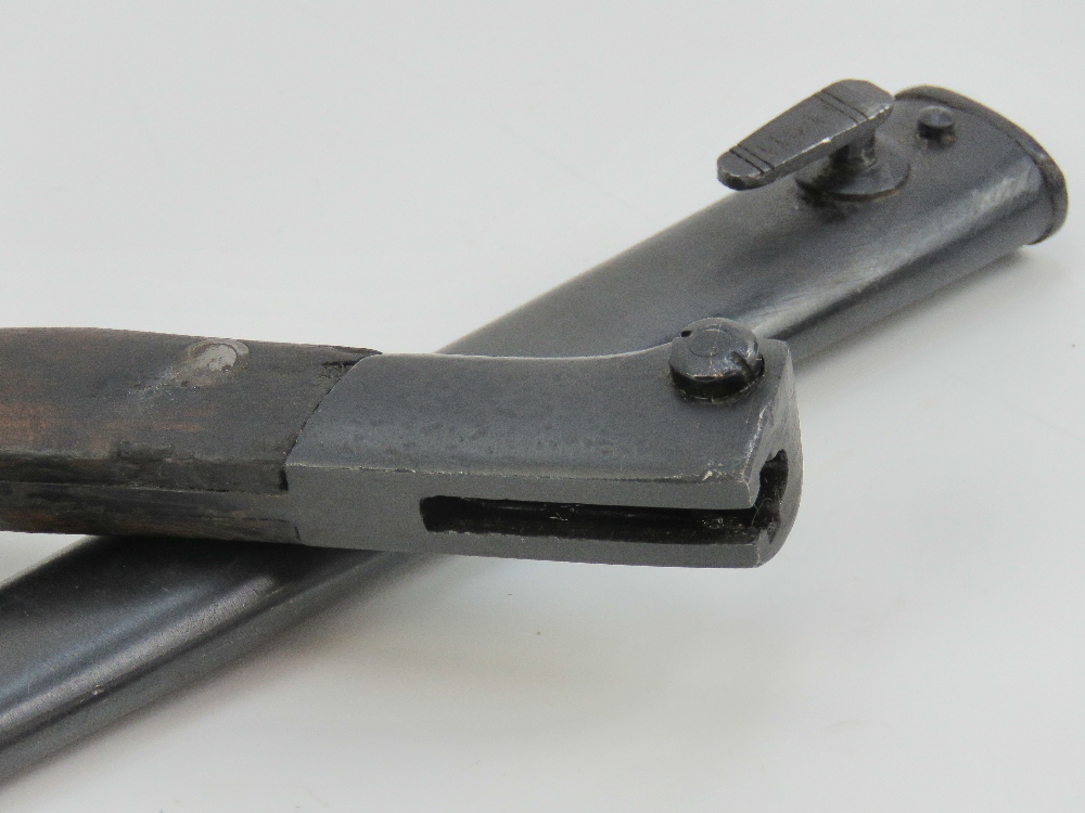 A Mauser Ugo 1944 bayonet with scabbard measuring 40cm in length. - Image 5 of 5