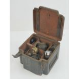 A quantity of WWII German Wehrmacht issue S Mine accessory tins containing a number of fuses and