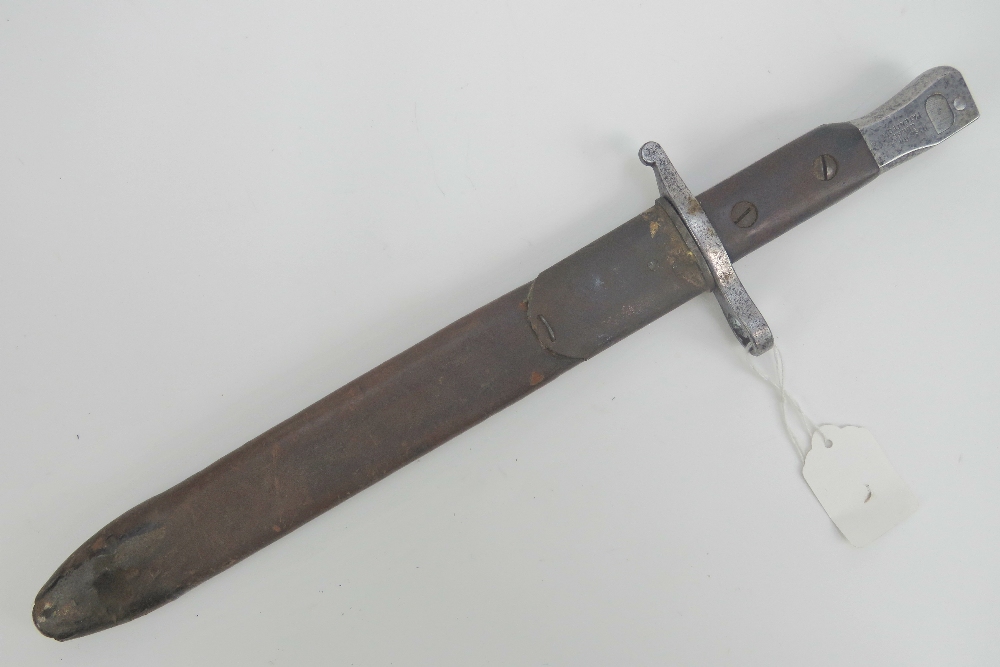 A WWI Canadian Infantry issue Ross rifle bayonet having regiment marks and dated 1912,