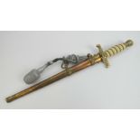 A WWII German Naval Officers dagger having brass scabbard and 25cm blade,