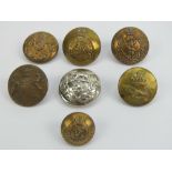 Seven military buttons being six brass buttons and one chromed button,