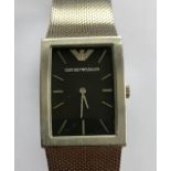 An Emporio Armani gentleman's stainless steel dress watch having black-ground square shaped dial