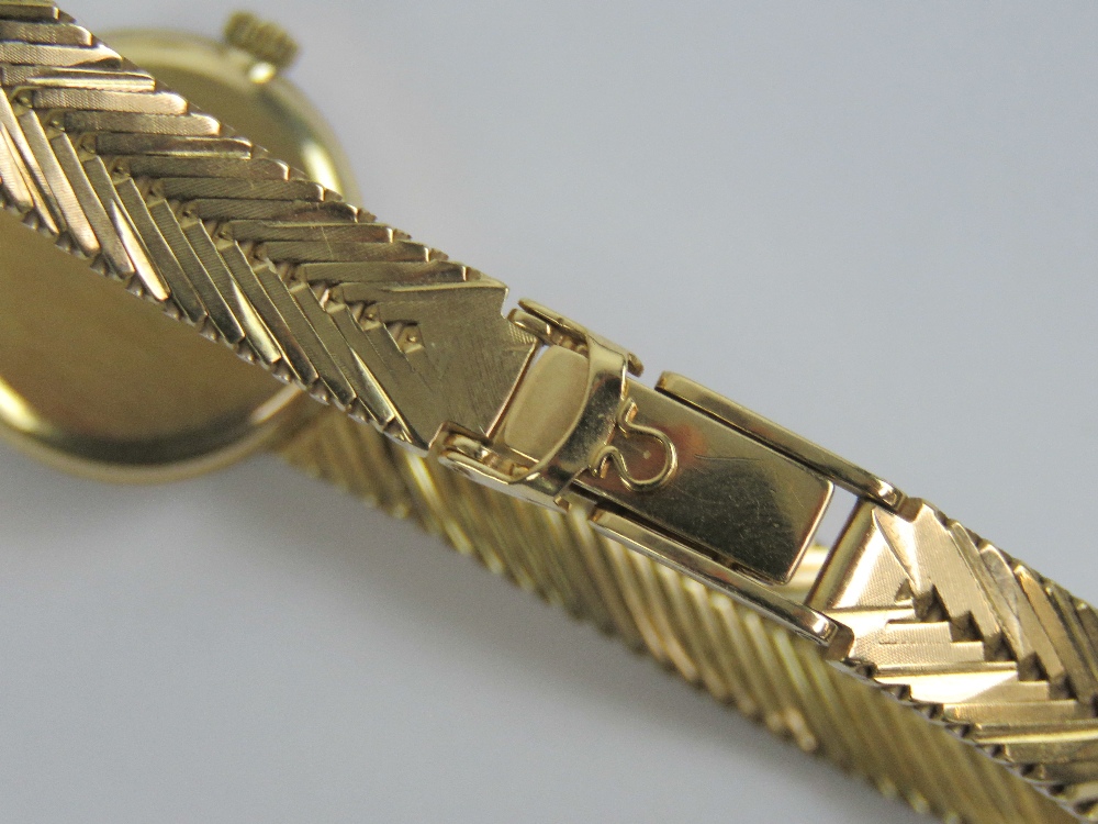 A 9ct gold ladies Omega cocktail wristwatch complete with integral 9ct gold strap, hallmarked 375, - Image 8 of 8