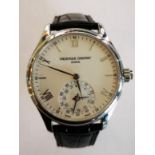 A Frederique Constant Geneve wrist watch having white dial with Arabic and Roman numerals,