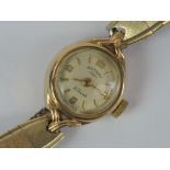 A 9ct gold ladies manual wind Rotary cocktail watch having cream dial with yellow metal hands and