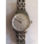 An Oris automatic wristwatch with silvered dial, white metal Arabic numerals, date aperture,