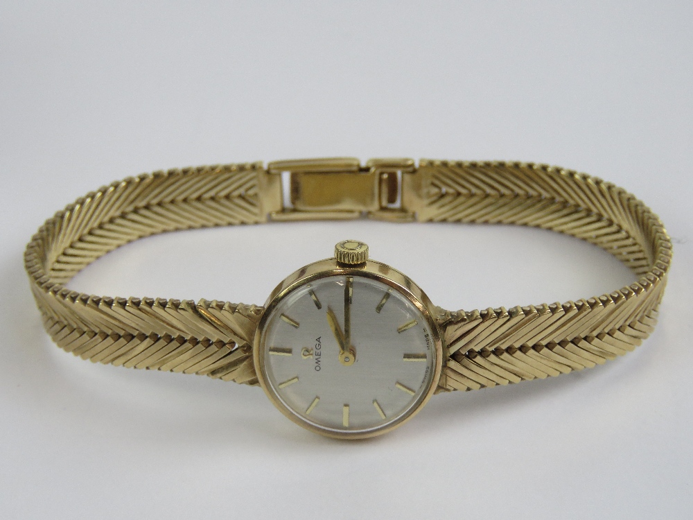 A 9ct gold ladies Omega cocktail wristwatch complete with integral 9ct gold strap, hallmarked 375, - Image 7 of 8